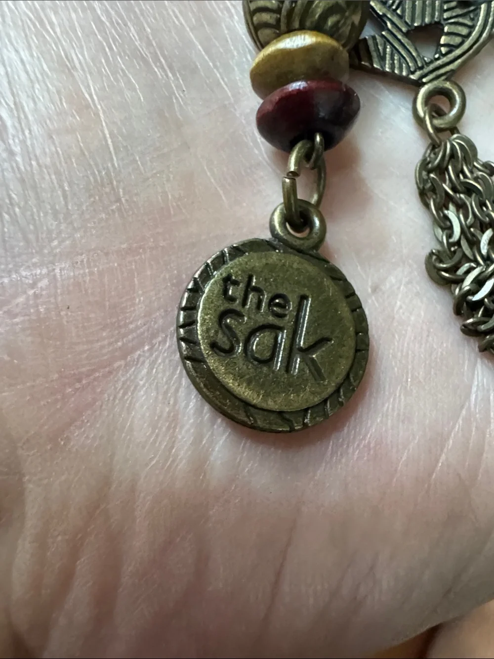 The Sak Antique Brass Multi-Charm Key & Card Holder with Pink Accent